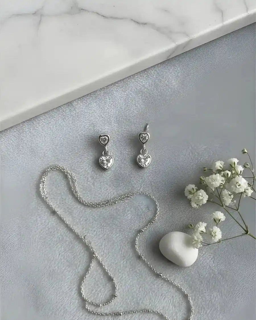 aros corazón colgante blanco de plata 925, diseño delicado de Sylara.
