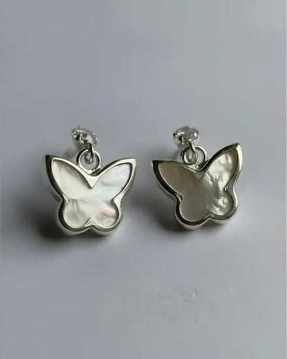 Aros mariposa colgante blanco en plata 925, estilo romántico de Sylara.